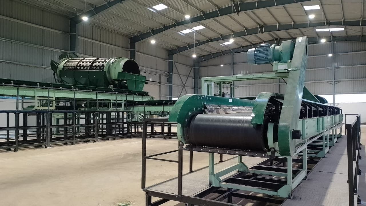 Interior of a materials recovery facility with sorting conveyors